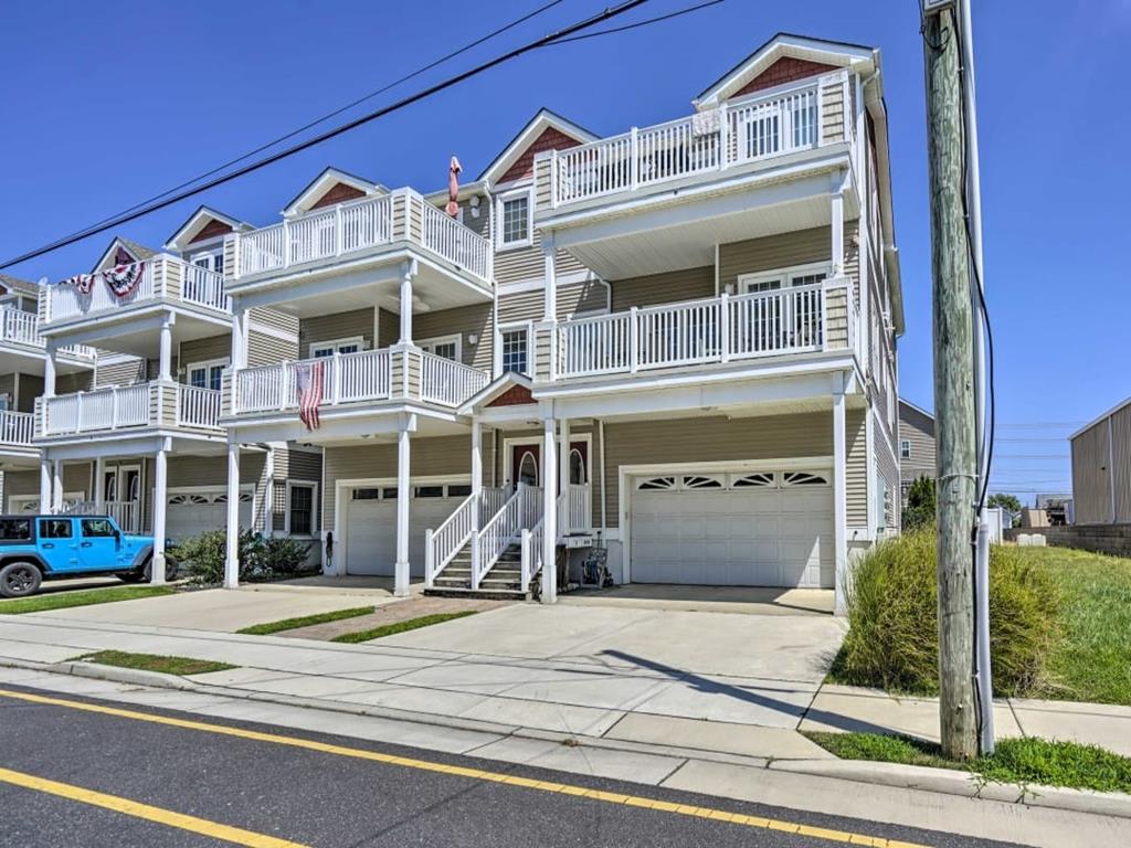411 WEST CEDAR AVENUE  UNIT D - WILDWOOD SUMMER VACATION RENTALS at WILDWOODRENTS.COM managed by ISLAND REALTY GROUP - 3 bedroom, 3 bath located bayside with a pool! Home offers a full kitchen with range, dishwasher, fridge, microwave, toaster and coffeemaker. Amenities include central a/c, washer/dryer, wifi, pool, balcony, and 2 car off street parking. Sleeps 8: queen, full & twin, full/twin bunk. Wildwood Rentals, North Wildwood Rentals, Wildwood Crest Rentals and Diamond Beach Rentals in all price ranges for weekly, monthly, seasonal and weekend vacation rentals plus Wildwood real estate sales of homes, condos, vacation and investment properties in and around Wildwood New Jersey. We offer over 400 properties plus exclusive vacation homes so you can book the shore rental of your choice online and guarantee your vacation at the Shore. Rent with confidence at Island Realty Group! Visit www.wildwoodrents.com to book online or call our office at 609.522.4999. Our office at 1701 New Jersey Avenue in North Wildwood is open 7 days a week!