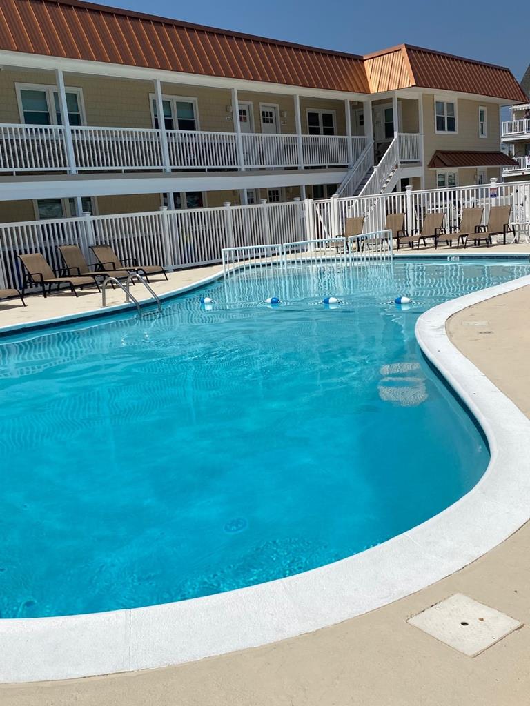 1501 OCEAN AVENUE  OCEAN 7 CONDOS #107 - NORTH WILDWOOD BEACHBLOCK SUMMER VACATION RENTALS with POOLS at WILDWOODRENTS.COM - Two bedroom, one bath condo located at the Ocean 7 Condominiums in North Wildwood. Home offers a full kitchen with range, fridge, microwave, blender, coffeemaker. Amenities include central a/c, coin op washer/dryer, wifi, pool, one car off street parking. Queen bed, 2 twin beds. - North Wildwood Rentals, Wildwood Rentals, Wildwood Crest Rentals and Diamond Beach Rentals in all price ranges for weekly, monthly, seasonal and weekend vacation rentals plus Wildwood real estate sales of homes, condos, vacation and investment properties in and around Wildwood New Jersey. We offer over 400 properties plus exclusive vacation homes so you can book the shore rental of your choice online and guarantee your vacation at the Shore. Rent with confidence at Island Realty Group! Visit www.wildwoodrents.com to book online or call our office at 609.522.4999. Our office at 1701 New Jersey Avenue in North Wildwood is open 7 days a week!
