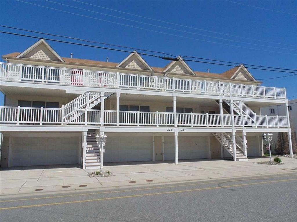 225 EAST DAVIS AVENUE  UNIT D - WILDWOOD SUMMER VACATION RENTALS at WILDWOODRENTS.COM managed by ISLAND REALTY GROUP  3 bedroom, 2 bath vacation home located 2 blocks to the beach in Wildwood. Home offers a full kitchen with range, fridge, dishwasher, disposal, microwave, blender, toaster and coffeemaker. Amenities include central a/c, washer/dryer, balcony and 3 car off street parking. Sleeps 8: queen, full, 2 twin and queen sleep sofa.  Wildwood Rentals, North Wildwood Rentals, Wildwood Crest Rentals and Diamond Beach Rentals in all price ranges for weekly, monthly, seasonal and weekend vacation rentals plus Wildwood real estate sales of homes, condos, vacation and investment properties in and around Wildwood New Jersey. We offer over 400 properties plus exclusive vacation homes so you can book the shore rental of your choice online and guarantee your vacation at the Shore. Rent with confidence at Island Realty Group! Visit www.wildwoodrents.com to book online or call our office at 609.522.4999. Our office at 1701 New Jersey Avenue in North Wildwood is open 7 days a week!