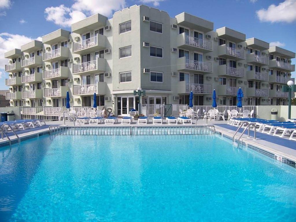 225 EAST WILDWOOD AVENUE  DIPLOMAT RESORT #202 - WILDWOOD SUMMER VACATION RENTALS with POOLS at WILDWOODRENTS.COM - One bedroom, one bath condo located at the Diplomat Condominiums in Wildwood. Unit has a kitchen with stovetop, fridge, microwave, toaster and coffeemaker. Sleeps 6; 2 full and full sleep sofa. Amenities include pool, outside shower, one car off street parking, gas bbq, elevator and wall a/c. Wildwood Rentals, North Wildwood Rentals, Wildwood Crest Rentals and Diamond Beach Rentals in all price ranges for weekly, monthly, seasonal and weekend vacation rentals plus Wildwood real estate sales of homes, condos, vacation and investment properties in and around Wildwood New Jersey. We offer over 400 properties plus exclusive vacation homes so you can book the shore rental of your choice online and guarantee your vacation at the Shore. Rent with confidence at Island Realty Group! Visit www.wildwoodrents.com to book online or call our office at 609.522.4999. Our office at 1701 New Jersey Avenue in North Wildwood is open 7 days a week!