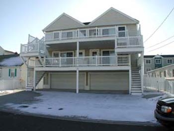 504 East 11th Avenue in North Wildwood - Three bedroom, two bath vacation home with ocean views. Home offers a full kitchen with range, fridge, icemaker, disposal, dishwasher, microwave, coffee maker and toaster. Amenities include central a/c, washer/dryer, wifi, balcony, outside shower, 1 car off-street parking & municipal parking permit for street parking of 2nd vehicle. Sleeps 9; king, queen, full/twin bunk, and full sleep sofa.