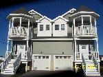 101 EAST 9TH AVENUE EAST - NORTH WILDWOOD RENTAL at WILDWOODRENTS.COM by ISLAND REALTY GROUP, NORTH WILDWOOD REALTORS - Spectacular brand new sundrenched 4 bedroom 3.5 bath townhouse located in North Wildwood is sure to make your stay a memorable and comfortable one! This fine home is located within walking distance to everything and offers a spacious living room, large dining area and gourmet kitchen. There is a fenced-in rear yard with covered deck off the living room. The second floor boats 4 bedrooms of which 2 are master suites with the front offering a covered balcony. Kitchen includes range, fridge, ice maker, disposal, dishwasher, microwave, coffeemaker, toaster, and blender. Sleeps 10; 3 queen, 2 full. Amenities include central a/c, washer/dryer, outside shower, gas grill, and 2 car off street parking. Make your reservation today as this property will not last long!