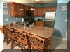 106 WEST SPRUCE AVENUE  CHAMPAGNE ISLAND #203 - NORTH WILDWOOD SUMMER VACATION RENTALS with POOLS at WILDWOODRENTS.COM managed by ISLAND REALTY GROUP - Welcome to your perfect vacation getaway in North Wildwood Beach Side! This stunning property is ideal for a family of up to 6 people, offering 2 bedrooms and 2 full bathrooms for your comfort and convenience. As you step inside, you'll be greeted by a beautifully furnished living space featuring 2 Queen beds and a cozy Queen sofa bed, ensuring a good night's sleep for everyone. The modern kitchen is fully equipped with all the essentials, including a dishwasher, microwave, toaster, blender, stove, and full-size refrigerator. Whether you're whipping up a quick breakfast or preparing a gourmet dinner, you'll find everything you need right at your fingertips. Relax and unwind in the spacious living room with cable TV and high-speed internet, or step outside to enjoy the fresh air on one of the two decks with deck furniture. Take a dip in the outdoor pool or soak up the sun on the balcony while admiring the beautiful views of the surrounding area. Tiki Bar located at the pool! This property also offers convenient amenities such as central AC, a vacuum cleaner, parking for one vehicle, an elevator to the ground floor, and a storage area for your belongings. For your convenience, this property comes fully furnished, but please remember to bring your own linens. Additional amenities include wireless internet access, Keurig coffee maker, mattress pads, pillows, pots and pans, silverware, dinnerware, cooking utensils, and three smart TVs for your entertainment. Don't miss out on the opportunity to experience the ultimate vacation in North Wildwood Beach Side. Book your stay now and create unforgettable memories in this beautiful rental property! North Wildwood Rentals, Wildwood Rentals, Wildwood Crest Rentals and Diamond Beach Rentals in all price ranges for weekly, monthly, seasonal and weekend vacation rentals plus Wildwood real estate sales of homes, condos, vacation and investment properties in and around Wildwood New Jersey. We offer over 400 properties plus exclusive vacation homes so you can book the shore rental of your choice online and guarantee your vacation at the Shore. Rent with confidence at Island Realty Group! Visit www.wildwoodrents.com to book online or call our office at 609.522.4999. Our office at 1701 New Jersey Avenue in North Wildwood is open 7 days a week!