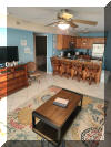 106 WEST SPRUCE AVENUE  CHAMPAGNE ISLAND #203 - NORTH WILDWOOD SUMMER VACATION RENTALS with POOLS at WILDWOODRENTS.COM managed by ISLAND REALTY GROUP - Welcome to your perfect vacation getaway in North Wildwood Beach Side! This stunning property is ideal for a family of up to 6 people, offering 2 bedrooms and 2 full bathrooms for your comfort and convenience. As you step inside, you'll be greeted by a beautifully furnished living space featuring 2 Queen beds and a cozy Queen sofa bed, ensuring a good night's sleep for everyone. The modern kitchen is fully equipped with all the essentials, including a dishwasher, microwave, toaster, blender, stove, and full-size refrigerator. Whether you're whipping up a quick breakfast or preparing a gourmet dinner, you'll find everything you need right at your fingertips. Relax and unwind in the spacious living room with cable TV and high-speed internet, or step outside to enjoy the fresh air on one of the two decks with deck furniture. Take a dip in the outdoor pool or soak up the sun on the balcony while admiring the beautiful views of the surrounding area. Tiki Bar located at the pool! This property also offers convenient amenities such as central AC, a vacuum cleaner, parking for one vehicle, an elevator to the ground floor, and a storage area for your belongings. For your convenience, this property comes fully furnished, but please remember to bring your own linens. Additional amenities include wireless internet access, Keurig coffee maker, mattress pads, pillows, pots and pans, silverware, dinnerware, cooking utensils, and three smart TVs for your entertainment. Don't miss out on the opportunity to experience the ultimate vacation in North Wildwood Beach Side. Book your stay now and create unforgettable memories in this beautiful rental property! North Wildwood Rentals, Wildwood Rentals, Wildwood Crest Rentals and Diamond Beach Rentals in all price ranges for weekly, monthly, seasonal and weekend vacation rentals plus Wildwood real estate sales of homes, condos, vacation and investment properties in and around Wildwood New Jersey. We offer over 400 properties plus exclusive vacation homes so you can book the shore rental of your choice online and guarantee your vacation at the Shore. Rent with confidence at Island Realty Group! Visit www.wildwoodrents.com to book online or call our office at 609.522.4999. Our office at 1701 New Jersey Avenue in North Wildwood is open 7 days a week!