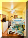 119 EAST MAGNOLIA AVENUE  UNIT 5 - WILDWOOD SUMMER VACATION RENTALS at WILDWOODRENTS.COM managed by ISLAND REALTY GROUP - 2 bedroom, 1 bath condo located at the Magnolia Condominiums. Home has a full kitchen with range, fridge, microwave, toaster oven, crock pot and coffee maker. Sleeps 6; queen, queen/twin bunk, twin sleep chair. Amenities include: wall a/c wifi, one car off street parking, balcony. Wildwood Rentals, North Wildwood Rentals, Wildwood Crest Rentals and Diamond Beach Rentals in all price ranges for weekly, monthly, seasonal and weekend vacation rentals plus Wildwood real estate sales of homes, condos, vacation and investment properties in and around Wildwood New Jersey. We offer over 400 properties plus exclusive vacation homes so you can book the shore rental of your choice online and guarantee your vacation at the Shore. Rent with confidence at Island Realty Group! Visit www.wildwoodrents.com to book online or call our office at 609.522.4999. Our office at 1701 New Jersey Avenue in North Wildwood is open 7 days a week!