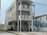 122 East Schellenger Avenue Unit 3 Wildwood Rentals - 3Bedroom 2 Bath condo is three blocks from the FREE beach/boardwalk. Can view Friday Night fireworks display from the balcony. There are two water parks, Splash Zone and Raging Water, plus Morey s Pier on the same street. Multitude of restaurants and bars as well as the boardwalk for some family fun. The Island Bowl Bowling Center and Alfie's Restaurant is right across the street. The convention center is within walking distance. The condo is decorated for comfort and a feeling of home away from home. Bedrooms have ceiling fans and TVs as well as central air for your comfort. The living room area has comfortable seating and a 26 LCD TV and DVD. The kitchen and dining area has large table with 6 chairs and appliances for your convenience. If a load of laundry needs to be done, a full size washer and dryer is in the condo. Behind the condo is our outdoor shower with hot/cold running water for your convenience to rise off. There is an outdoor storage unit with lock to place all your beach chairs, wagons, bikes etc.. next to the showers. This is a no pet/non-smoking property. There are two off street parking spots in front of condo. 