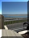 134 WEST PINE_AVENUE  UNIT B - NORTH WILDWOOD WATERVIEW SUMMER VACATION RENTALS with POOLS at WILDWOODRENTS.COM managed by ISLAND REALTY GROUP - Amazing ocean/inlet water views! Welcome to your perfect beach getaway in North Wildwood! This charming property is located in the highly sought-after North Wildwood Beach Side area and is ready to welcome up to 6 guests in its comfortable 3 bedrooms and 2 full bathrooms. As you step inside, you'll find a cozy and well-equipped home that offers everything you need for a relaxing stay. The bedrooms feature 1 Queen Bed, 1 Double Bed, and 2 Single Beds, ensuring everyone has a comfortable place to rest after a day of fun in the sun. The modern kitchen is fully stocked with all the essential appliances, including a dishwasher, microwave, disposal, toaster oven, stove, full-size refrigerator, oven, and Keurig coffee maker. Whip up your favorite meals and enjoy them in the spacious dining area or out on the deck with deck furniture for al fresco dining. The property is equipped with central AC and ceiling fans to keep you cool on warm summer days, as well as a washer, dryer, iron, ironing board, and vacuum cleaner for your convenience. Entertainment options include a television with cable TV, Smart TV with streaming services, and high-speed internet for your browsing pleasure. During your stay, take advantage of the community outdoor pool and association pool for a refreshing swim or soak up the sun on the balcony. Please note that this property does not allow pets and guests are required to bring their own linens. Don't miss out on this fantastic opportunity to experience all that North Wildwood has to offer. Book your stay now and start creating unforgettable memories at this lovely beachside property!  North Wildwood Rentals, Wildwood Rentals, Wildwood Crest Rentals and Diamond Beach Rentals in all price ranges for weekly, monthly, seasonal and weekend vacation rentals plus Wildwood real estate sales of homes, condos, vacation and investment properties in and around Wildwood New Jersey. We offer over 400 properties plus exclusive vacation homes so you can book the shore rental of your choice online and guarantee your vacation at the Shore. Rent with confidence at Island Realty Group! Visit www.wildwoodrents.com to book online or call our office at 609.522.4999. Our office at 1701 New Jersey Avenue in North Wildwood is open 7 days a week!