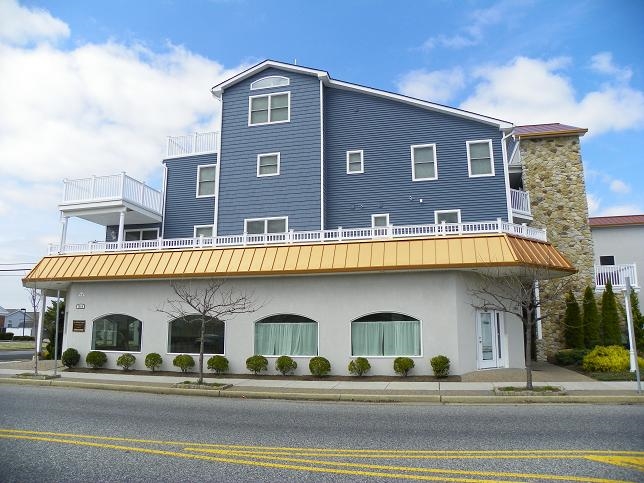 1810 NEW JERSEY AVENUE #303 - SUMMER RENTAL in NORTH WILDWOOD - Three bedroom, two bath vacation home located in North Wildwood. Complex offers a pool, hot tub, elevator, 2 car off street parking, outside shower, and gas bbq. Home has a full kitchen with range, fridge, icemaker, disposal, dishwasher, microwave, coffeemaker, blender, and toaster. Sleeps 8; king, queen, 2 twin and queen sleep sofa. Amenities include central a/c, washer/dryer, wifi, 2 balconies with a panoramic view!