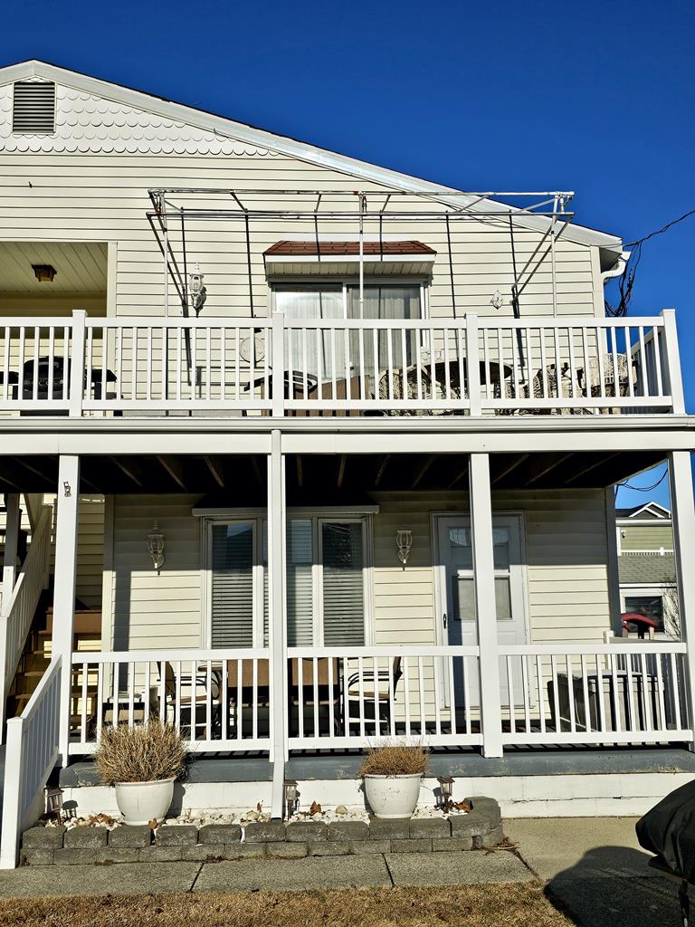 207 EAST 11TH AVENUE  OCEANSIDE UNIT - NORTH WILDWOOD SUMMER VACATION RENTALS at WILDWOODRENTS.COM managed by ISLAND REALTY GROUP - Welcome to your beachside getaway in North Wildwood! This charming property is ideal for a family of up to 6 guests, offering 2 cozy bedrooms and 1 full bathroom. As you step inside, you'll find a comfortable living space with all the amenities you need for a relaxing stay. The kitchen is fully equipped with a microwave, coffee maker, toaster, blender, stove, full-size refrigerator, oven, and all the cooking utensils you could need. Enjoy your meals at the dining table. The bedroom feature 2 single beds (swing king). The 2nd bedroom is a twin and full/twin bunk bed , there is an air mattress for additional sleeping arrangements. All beds come with mattress pads, pillows, and blankets to ensure a restful night's sleep. Relax on the open/covered porch with deck furniture, perfect for enjoying the fresh sea breeze. Stay entertained with the smart TV and free WiFi provided. This property is pet-free and smoke-free, ensuring a clean and comfortable environment for all guests. Located just a few blocks away from North Wildwood Beach, this property offers easy access to the sand and surf. Take advantage of the lawn area, play area, and BBQ natural gas grill for outdoor fun. Don't miss out on this fantastic vacation rental in North Wildwood! Book your stay now and create unforgettable memories by the shore. North Wildwood Rentals, Wildwood Rentals, Wildwood Crest Rentals and Diamond Beach Rentals in all price ranges for weekly, monthly, seasonal and weekend vacation rentals plus Wildwood real estate sales of homes, condos, vacation and investment properties in and around Wildwood New Jersey. We offer over 400 properties plus exclusive vacation homes so you can book the shore rental of your choice online and guarantee your vacation at the Shore. Rent with confidence at Island Realty Group! Visit www.wildwoodrents.com to book online or call our office at 609.522.4999. Our office at 1701 New Jersey Avenue in North Wildwood is open 7 days a week!