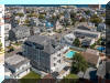 208 EAST 24TH AVENUE – UNIT #4 - NORTH WILDWOOD SUMMER VACATION RENTALS with POOLS & PRIVATE ELEVATOR at WILDWOODRENTS.COM managed by ISLAND REALTY GROUP - 4 bedroom, 2 bath vacation home with pool and private elevator! Ocean/bay view from the balconies. Home has a full kitchen with range, fridge, dishwasher, microwave, toaster, Keurig, disposal, and blender. Sleeps 10: king, queen, full/twin bunk and twin stand alone, queen sleep sofa. Amenities include: central a/c, washer/dryer, 2 car off street parking, wifi, pool, private elevator, storage, gas BBQ, No television in the main living room, televisions are in all 4 bedrooms. North Wildwood Rentals, Wildwood Rentals, Wildwood Crest Rentals and Diamond Beach Rentals in all price ranges for weekly, monthly, seasonal and weekend vacation rentals plus Wildwood real estate sales of homes, condos, vacation and investment properties in and around Wildwood New Jersey. We offer over 400 properties plus exclusive vacation homes so you can book the shore rental of your choice online and guarantee your vacation at the Shore. Rent with confidence at Island Realty Group! Visit www.wildwoodrents.com to book online or call our office at 609.522.4999. Our office at 1701 New Jersey Avenue in North Wildwood is open 7 days a week!