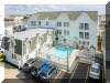 213 EAST HAND AVENUE  SEABIRD CONDOMINIUMS #1 - WILDWOOD SUMMER VACATION RENTALS with POOLS at WILDWOODRENTS.COM managed by ISLAND REALTY GROUP, WILDWOOD REALTORS AND VACATION RENTAL MANAGEMENT - Located just two short blocks to the Wildwood Boardwalk & Beach! You don't want to miss out on this spacious 4 bedroom condo. First floor includes large living room area, eat-in kitchen, dining room and half bath. Second floor includes another spacious living space overlooking the beautiful pool area & sundeck along with a bedroom and large bathroom with jetted tub. Third floor includes another 3 bedrooms and 2 full bathrooms. 2 Assigned parking spots. Wildwood Rentals, North Wildwood Rentals, Wildwood Crest Rentals and Diamond Beach Rentals in all price ranges for weekly, monthly, seasonal and weekend vacation rentals plus Wildwood real estate sales of homes, condos, vacation and investment properties in and around Wildwood New Jersey. We offer over 400 properties plus exclusive vacation homes so you can book the shore rental of your choice online and guarantee your vacation at the Shore. Rent with confidence at Island Realty Group! Visit www.wildwoodrents.com to book online or call our office at 609.522.4999. Our office at 1701 New Jersey Avenue in North Wildwood is open 7 days a week!