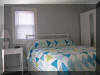 214 EAST BENNETT AVENUE - UNIT 3 FRONT - WILDWOOD PET FRIENDLY SUMMER RENTALS - Three bedroom, one bath "dog friendly" apartment located in Wildwood. Home has a full kitchen with range, fridge, dishwasher, toaster, microwave, blender, coffee maker and disposal. Sleeps 9; queen, full , full/twin bunk, queen sleep sofa. Amenities include window a/c, wifi. There is a shared yard, gas bbq and outside shower.