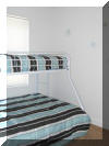 216 EAST MAPLE AVENUE, WILDWOOD SUMMER VACATION RENTAL - Brand new! 3 bedroom, one bath vacation home! Two blocks to the beach and the boardwalk, and located close to Morey s Pier! Full kitchen has range, fridge, dishwasher, disposal, toaster, coffeemaker and microwave. Amenities include central a/c, washer/dryer, large deck, gas grill, and 2 car, outside shower, off street parking. Sleeps 8; 2 queen, full/twin bunk, and full sleep sofa. 