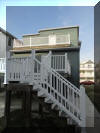 216 EAST MAPLE AVENUE, WILDWOOD SUMMER VACATION RENTAL - Brand new! 3 bedroom, one bath vacation home! Two blocks to the beach and the boardwalk, and located close to Morey s Pier! Full kitchen has range, fridge, dishwasher, disposal, toaster, coffeemaker and microwave. Amenities include central a/c, washer/dryer, large deck, gas grill, and 2 car, outside shower, off street parking. Sleeps 8; 2 queen, full/twin bunk, and full sleep sofa. 