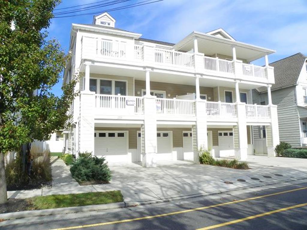 219 EAST MAPLE AVENUE  UNIT 1A - WILDWOOD SUMMER VACATION RENTALS at WILDWOODRENTS.COM - 3 bedroom, 2 bath vacation home centrally located on Maple Avenue between the two amusement piers. Home offers a full kitchen with range, fridge, dishwasher, disposal, microwave, blender, Keurig and coffeemaker. Amenities include central a/c, washer/dryer, wifi, 2 car off street parking, balcony and outside shower. Sleeps 9; queen, double, 3 twin, double sleep sofa. Wildwood Rentals, North Wildwood Rentals, Wildwood Crest Rentals and Diamond Beach Rentals in all price ranges for weekly, monthly, seasonal and weekend vacation rentals plus Wildwood real estate sales of homes, condos, vacation and investment properties in and around Wildwood New Jersey. We offer over 400 properties plus exclusive vacation homes so you can book the shore rental of your choice online and guarantee your vacation at the Shore. Rent with confidence at Island Realty Group! Visit www.wildwoodrents.com to book online or call our office at 609.522.4999. Our office at 1701 New Jersey Avenue in North Wildwood is open 7 days a week!