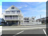 2207 SURF AVENUE � BAYBERRY CONDOS #101 - NORTH WILDWOOD BEACHBLOCK SUMMER VACATION RENTALS with POOLS at WILDWOODRENTS.COM managed by ISLAND REALTY GROUP Welcome to your perfect beachside getaway in North Wildwood! This charming property is ideal for a family of up to 6 guests, offering 2 bedrooms and 1 full bathroom for your comfort and convenience. As you step inside, you'll find a cozy living space with modern furnishings and a welcoming atmosphere. The living room features a comfortable sofa bed that can accommodate 2 guests, along with a Smart TV for your entertainment needs. The fully equipped kitchen, complete with a dishwasher, microwave, Keurig coffee maker, toaster, blender, stove, oven, and full-size refrigerator. Whip up delicious meals and snacks to enjoy at the dining table or out on the deck with deck furniture and a shared BBQ gas grill. When it's time to rest, retreat to one of the two bedrooms, each offering queen beds with pillows and blankets for a restful night's sleep. With high-speed internet and wireless LAN available, you can stay connected throughout your stay. Pool, outside shower, beach block! During your visit, take advantage of the property's amenities, including central A/C, ceiling fans, shared washer/dryer, parking for one vehicle, and access to the outdoor pool and association pool. After a day at the beach, rinse off in the shared outside shower before relaxing on the balcony or open/covered porch. Please note that this property does not allow pets and linens are not provided, so be sure to bring your own. Cleaning is included in the rate for your convenience. Don't miss out on this fantastic opportunity to experience the best of North Wildwood! Book your stay today and make unforgettable memories at this beachside retreat. North Wildwood Rentals, Wildwood Rentals, Wildwood Crest Rentals and Diamond Beach Rentals in all price ranges for weekly, monthly, seasonal and weekend vacation rentals plus Wildwood real estate sales of homes, condos, vacation and investment properties in and around Wildwood New Jersey. We offer over 400 properties plus exclusive vacation homes so you can book the shore rental of your choice online and guarantee your vacation at the Shore. Rent with confidence at Island Realty Group! Visit www.wildwoodrents.com to book online or call our office at 609.522.4999. Our office at 1701 New Jersey Avenue in North Wildwood is open 7 days a week! 
