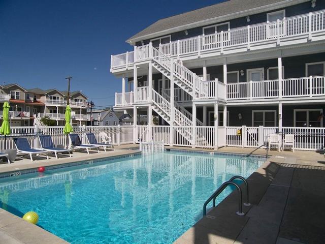 2207 SURF AVENUE – BAYBERRY #301 - NORTH WILDWOOD BEACHBLOCK SUMMER VACATION RENTALS with POOLS at WILDWOODRENTS.COM managed by ISLAND REALTY GROUP. Two bedroom, two bath vacation home located Beachblock at the Bayberry Condominiums in North Wildwood. Home offers a full kitchen with fridge, range, dishwasher, microwave, blender, crock-pot and Keurig. Sleeps 10: 3 queen beds, 2 double sleep sofas. Amenities include central a/c, washer/dryer, 1 car off street parking, wifi, pool, balcony, bbq. Upgrades to be completed for 2021: new flooring, cabinets, granite counters, new living room furnishings-pictures to follow. North Wildwood Rentals, Wildwood Rentals, Wildwood Crest Rentals and Diamond Beach Rentals in all price ranges for weekly, monthly, seasonal and weekend vacation rentals plus Wildwood real estate sales of homes, condos, vacation and investment properties in and around Wildwood New Jersey. We offer over 400 properties plus exclusive vacation homes so you can book the shore rental of your choice online and guarantee your vacation at the Shore. Rent with confidence at Island Realty Group! Visit www.wildwoodrents.com to book online or call our office at 609.522.4999. Our office at 1701 New Jersey Avenue in North Wildwood is open 7 days a week!