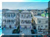 220 EAST LINCOLN AVENUE  UNIT 1 - WILDWOOD SUMMER VACATION RENTALS at WILDWOODRENTS.COM managed by ISLAND REALTY GROUP, WILDWOOD REALTORS AND VACATION RENTAL MANAGEMENT - Welcome to your dream vacation rental in Wildwood Beach Side! This spacious property can comfortably accommodate up to 10 guests, making it the perfect getaway for families or groups of friends looking to enjoy all that Wildwood has to offer. With 4 bedrooms, 2 full bathrooms, and 1 half bathroom, there is plenty of space for everyone to relax and unwind. The sleeping arrangements include 1 King Bed, 2 Queen Beds, and 2 twin/twin Bunk Beds, ensuring a comfortable night's sleep for all. The property is equipped with all the amenities you could need for a stress-free stay. From a fully stocked kitchen with a dishwasher, microwave, coffee maker, and more, to central AC, gas heat, and a washer and dryer for your convenience. Entertainment options include 3 smart TVs, tenant must use own streaming logins, and wireless internet. Outside, you'll find a deck with furniture, perfect for enjoying your morning coffee or evening cocktails. There is also an outside shower to rinse off after a day at the beach. Parking is a breeze with a 1 car garage and 1 parking space available. For families traveling with little ones, baby equipment, a high chair, and a crib are provided. And for those who like to cook, the kitchen is fully equipped with everything you need to prepare delicious meals during your stay. Please note that this property is smoke-free and does not allow pets. Cleaning is included in the rate, so you can spend more time enjoying your vacation and less time worrying about chores. Don't miss out on the opportunity to stay in this fantastic vacation rental in Wildwood. Book your stay today and start counting down the days until your beachside getaway! Wildwood Rentals, North Wildwood Rentals, Wildwood Crest Rentals and Diamond Beach Rentals in all price ranges for weekly, monthly, seasonal and weekend vacation rentals plus Wildwood real estate sales of homes, condos, vacation and investment properties in and around Wildwood New Jersey. We offer over 400 properties plus exclusive vacation homes so you can book the shore rental of your choice online and guarantee your vacation at the Shore. Rent with confidence at Island Realty Group! Visit www.wildwoodrents.com to book online or call our office at 609.522.4999. Our office at 1701 New Jersey Avenue in North Wildwood is open 7 days a week!