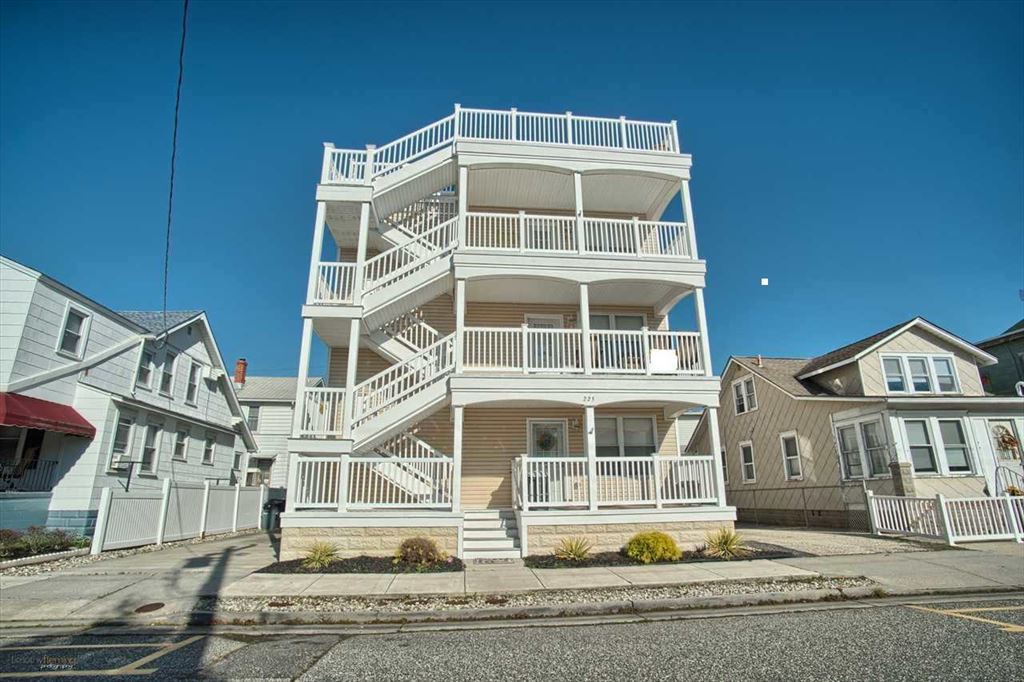 225 EAST JUNIPER AVENUE #201S - WILDWOOD RENTALS - Three bedroom, two bath located 2 blocks to the beach and boardwalk. Home has a full kitchen with range, fridge, dishwasher, microwave, blender, toaster, and coffeemaker. Sleeps 7; queen, full, 3 twin. Amenities include central a/c, washer/dryer, wifi, balcony, 2 car off street parking. Centrally located, and close to Morey's Piers. Wildwood Rentals, North Wildwood Rentals, Wildwood Crest Rentals and Diamond Beach Rentals in all price ranges for weekly, monthly, seasonal and weekend vacation rentals plus Wildwood real estate sales of homes, condos, vacation and investment properties in and around Wildwood New Jersey. We offer over 400 properties plus exclusive vacation homes so you can book the shore rental of your choice online and guarantee your vacation at the Shore. Rent with confidence at Island Realty Group!