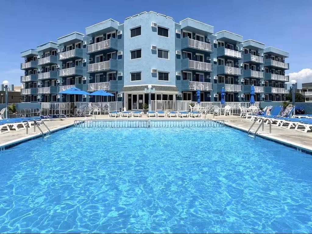 225 EAST WILDWOOD AVENUE - DIPLOMAT RESORT CONDOMINIUMS Unit 505 - WILDWOOD SUMMER VACATION RENTALS -  only 2 short blocks from the world-famous Wildwood boardwalk, beach and amusements. Large pool and sundeck make this elevator building the perfect summer vacation for the whole family. 1 bedroom, 1 bath condo located at the Diplomat Condominiums in Wildwood. Unit has a kitchen with stovetop, fridge, microwave, toaster and coffeemaker. Sleeps 4; 1 King and 1 Double sleep sofa. Amenities include large pool, outside shower, one car off street parking, gas bbq, elevator, arcade and wall a/c. Wildwood Rentals, North Wildwood Rentals, Wildwood Crest Rentals and Diamond Beach Rentals in all price ranges for weekly, monthly, seasonal and weekend vacation rentals plus Wildwood real estate sales of homes, condos, vacation and investment properties in and around Wildwood New Jersey. We offer over 400 properties plus exclusive vacation homes so you can book the shore rental of your choice online and guarantee your vacation at the Shore. Rent with confidence at Island Realty Group! Visit www.wildwoodrents.com to book online or call our office at 609.522.4999. We're open 7 days a week!