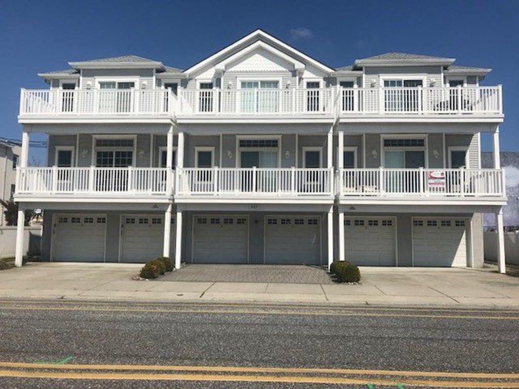 229 EAST LINCON AVENUE - UNIT A - WILDWOOD SUMMER VACATION RENTALS at WILDWOODRENTS.COM managed by ISLAND REALTY GROUP, WILDWOOD REALTORS AND VACATION RENTAL MANAGEMENT - Three bedroom, two bath vacation home that has been recently updated! Home has a full kitchen with range, fridge, icemaker, dishwasher, disposal, microwave, coffeemaker and toaster. Amenities include central a/c, washer/dryer, wifi, balcony and 3 car off street parking. Sleeps 9; twin/twin bunk, twin/full bunk, queen, and full. Wildwood Rentals, North Wildwood Rentals, Wildwood Crest Rentals and Diamond Beach Rentals in all price ranges for weekly, monthly, seasonal and weekend vacation rentals plus Wildwood real estate sales of homes, condos, vacation and investment properties in and around Wildwood New Jersey. We offer over 400 properties plus exclusive vacation homes so you can book the shore rental of your choice online and guarantee your vacation at the Shore. Rent with confidence at Island Realty Group! Visit www.wildwoodrents.com to book online or call our office at 609.522.4999. Our office at 1701 New Jersey Avenue in North Wildwood is open 7 days a week!