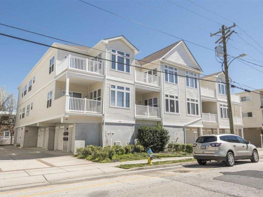 229 EAST PINE AVENUE  #103 - WILDWOOD SUMMER VACATION RENTALS at WILDWOODRENTS.COM - 3 bedroom, 2 bath vacation home centrally located between both amusement piers! Home offers a full kitchen with range, fridge, dishwasher, disposal, microwave, coffee maker and toaster. Sleeps 9, king, 2 queen, 3 twin. Amenities include central a/c, washer/dryer, streaming devices, off street parking for 4 cars and outside shower! Wildwood Rentals, North Wildwood Rentals, Wildwood Crest Rentals and Diamond Beach Rentals in all price ranges for weekly, monthly, seasonal and weekend vacation rentals plus Wildwood real estate sales of homes, condos, vacation and investment properties in and around Wildwood New Jersey. We offer over 400 properties plus exclusive vacation homes so you can book the shore rental of your choice online and guarantee your vacation at the Shore. Rent with confidence at Island Realty Group! Visit www.wildwoodrents.com to book online or call our office at 609.522.4999. Our office at 1701 New Jersey Avenue in North Wildwood is open 7 days a week!