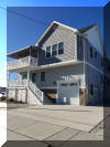 2312 NEW YORK AVENUE - NORTH WILDWOOD SINGLE FAMILY SUMMER VACATION RENTALS at WILDWOODRENTS.COM managed by ISLAND REALTY GROUP - 3 bedroom, 2 bath vacation home located in North Wildwood. Home offers a full kitchen with range, fridge, dishwasher, microwave, toaster, Keurig, disposal, and air fryer. Amenities include central a/c, washer/dryer, 4 car off street parking, wifi, balcony, outside shower. TV is streaming only, no live cable provided. Sleeps 10:  1 King, 1Double, 2 Singles, 1 Queen Sleep Sofa, 1 Air Mattress. First floor has 2 bedrooms and Jack & Jill bath! Second floor has great room with cathedral ceiling, half bath, and master bedroom/ bath. Large floor plan provides space for all to enjoy! North Wildwood Rentals, Wildwood Rentals, Wildwood Crest Rentals and Diamond Beach Rentals in all price ranges for weekly, monthly, seasonal and weekend vacation rentals plus Wildwood real estate sales of homes, condos, vacation and investment properties in and around Wildwood New Jersey. We offer over 400 properties plus exclusive vacation homes so you can book the shore rental of your choice online and guarantee your vacation at the Shore. Rent with confidence at Island Realty Group! Visit www.wildwoodrents.com to book online or call our office at 609.522.4999. Our office at 1701 New Jersey Avenue in North Wildwood is open 7 days a week!