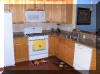 2407 SURF AVENUE - NORTH WILDWOOD SUMMER RENTALS WITH POOLS - Four bedroom, 2.5 bath townhome located on the same block as the beach and boardwalk in North Wildwood. Townhouse has a full kitchen with fridge, icemaker, range, dishwasher, disposal, coffeemaker, toaster, and blender. Amenities include central a/c, washer/dryer, wi-fi internet, balcony and two car off street parking, pool and outside shower. Sleeps 12; 2 queen, 2 full, 2 twin, and futon sleep sofa.