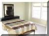 2407 SURF AVENUE - NORTH WILDWOOD SUMMER RENTALS WITH POOLS - Four bedroom, 2.5 bath townhome located on the same block as the beach and boardwalk in North Wildwood. Townhouse has a full kitchen with fridge, icemaker, range, dishwasher, disposal, coffeemaker, toaster, and blender. Amenities include central a/c, washer/dryer, wi-fi internet, balcony and two car off street parking, pool and outside shower. Sleeps 12; 2 queen, 2 full, 2 twin, and futon sleep sofa.