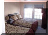 2407 SURF AVENUE - NORTH WILDWOOD SUMMER RENTALS WITH POOLS - Four bedroom, 2.5 bath townhome located on the same block as the beach and boardwalk in North Wildwood. Townhouse has a full kitchen with fridge, icemaker, range, dishwasher, disposal, coffeemaker, toaster, and blender. Amenities include central a/c, washer/dryer, wi-fi internet, balcony and two car off street parking, pool and outside shower. Sleeps 12; 2 queen, 2 full, 2 twin, and futon sleep sofa.