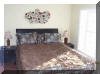 2407 SURF AVENUE - NORTH WILDWOOD SUMMER RENTALS WITH POOLS - Four bedroom, 2.5 bath townhome located on the same block as the beach and boardwalk in North Wildwood. Townhouse has a full kitchen with fridge, icemaker, range, dishwasher, disposal, coffeemaker, toaster, and blender. Amenities include central a/c, washer/dryer, wi-fi internet, balcony and two car off street parking, pool and outside shower. Sleeps 12; 2 queen, 2 full, 2 twin, and futon sleep sofa.