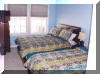 2407 SURF AVENUE - NORTH WILDWOOD SUMMER RENTALS WITH POOLS - Four bedroom, 2.5 bath townhome located on the same block as the beach and boardwalk in North Wildwood. Townhouse has a full kitchen with fridge, icemaker, range, dishwasher, disposal, coffeemaker, toaster, and blender. Amenities include central a/c, washer/dryer, wi-fi internet, balcony and two car off street parking, pool and outside shower. Sleeps 12; 2 queen, 2 full, 2 twin, and futon sleep sofa.