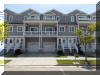 300 EAST 24TH AVENUE - UNIT D - NORTH WILDWOOD SUMMER VACTION RENTALS - Large townhouse with 4 bedrooms, 2/5 baths! First floor has a bedroom with 2 bunks: full/twin and twin/twin and a full futon. Second floor has large spacious living room, dining room, kitchen and 1/2 bath. The kitchen is fully equipped with range, fridge, ice maker, microwave, toaster, disposal, blender and Keurig. Third has hall bath, bedroom with a full bed, bedroom with a twin bed w/twin trundle and queen master bedroom. Amenities include central a/c, washer/dryer, wifi, balconies, and 2 car off street parking. North Wildwood Rentals, Wildwood Rentals, Wildwood Crest Rentals and Diamond Beach Rentals in all price ranges for weekly, monthly, seasonal and weekend vacation rentals plus Wildwood real estate sales of homes, condos, vacation and investment properties in and around Wildwood New Jersey. We offer over 400 properties plus exclusive vacation homes so you can book the shore rental of your choice online and guarantee your vacation at the Shore. Rent with confidence at Island Realty Group! Visit www.wildwoodrents.com to book online or call our office at 609.522.4999. Our office at 1701 New Jersey Avenue in North Wildwood is open 7 days a week!