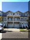 300 EAST 24TH AVENUE - UNIT D - NORTH WILDWOOD SUMMER VACTION RENTALS - Large townhouse with 4 bedrooms, 2/5 baths! First floor has a bedroom with 2 bunks: full/twin and twin/twin and a full futon. Second floor has large spacious living room, dining room, kitchen and 1/2 bath. The kitchen is fully equipped with range, fridge, ice maker, microwave, toaster, disposal, blender and Keurig. Third has hall bath, bedroom with a full bed, bedroom with a twin bed w/twin trundle and queen master bedroom. Amenities include central a/c, washer/dryer, wifi, balconies, and 2 car off street parking. North Wildwood Rentals, Wildwood Rentals, Wildwood Crest Rentals and Diamond Beach Rentals in all price ranges for weekly, monthly, seasonal and weekend vacation rentals plus Wildwood real estate sales of homes, condos, vacation and investment properties in and around Wildwood New Jersey. We offer over 400 properties plus exclusive vacation homes so you can book the shore rental of your choice online and guarantee your vacation at the Shore. Rent with confidence at Island Realty Group! Visit www.wildwoodrents.com to book online or call our office at 609.522.4999. Our office at 1701 New Jersey Avenue in North Wildwood is open 7 days a week!