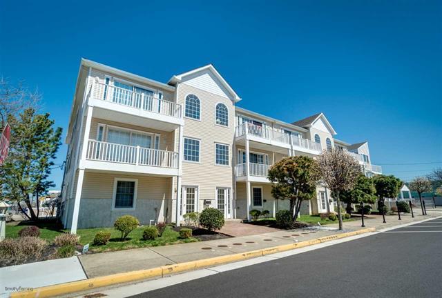 301 EAST LEAMING AVENUE UNIT F - WILDWOOD SUMMER VACATION RENTALS - Three bedroom, two bath vacation home located one short block to the beach and boardwalk on the border of Wildwood Crest. Home offers a full kitchen with range, fridge, dishwasher, disposal, microwave, coffeemaker, toaster and blender. Amenities include central a/c, washer/dryer, wifi, balcony, and 2 car off street parking. Sleeps 8; king, queen, 2 twin and queen sleep sofa. Wildwood Rentals, North Wildwood Rentals, Wildwood Crest Rentals and Diamond Beach Rentals in all price ranges for weekly, monthly, seasonal and weekend vacation rentals plus Wildwood real estate sales of homes, condos, vacation and investment properties in and around Wildwood New Jersey. We offer over 400 properties plus exclusive vacation homes so you can book the shore rental of your choice online and guarantee your vacation at the Shore. Rent with confidence at Island Realty Group!