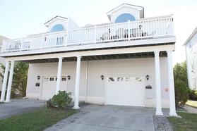 316 EAST MAPLE AVENUE - WILDWOOD SUMMER RENTALS - Spacious 5 bedroom, 3 bath townhouse style vacation home located 1.5 blocks to the beach and boardwalk. Home has a full kitchen with range, fridge, dishwasher, microwave, blender, coffeemaker and toaster. Amenities include central a/c, ceiling fans, washer/dryer, 3 car off street parking, gas grill, balcony. Wildwood Rentals, North Wildwood Rentals, Wildwood Crest Rentals and Diamond Beach Rentals in all price ranges for weekly, monthly, seasonal and weekend vacation rentals plus Wildwood real estate sales of homes, condos, vacation and investment properties in and around Wildwood New Jersey. We offer over 400 properties plus exclusive vacation homes so you can book the shore rental of your choice online and guarantee your vacation at the Shore. Rent with confidence at Island Realty Group!