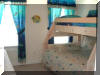 317 East 24th Avenue, Ocean Hollow condominiums 3 bedroom, 2.5 bath vacation home located 2 blocks to the beach and boardwalk in North Wildwood. Home has a full kitchen with range, fridge, microwave, dishwasher, coffeemaker, blender and toaster. Amenities include: pool, central a/c, balcony, washer/dryer, and two car off street parking. Sleeps 9; 2 queen, full/twin bunk bed, and queen sleep sofa. 