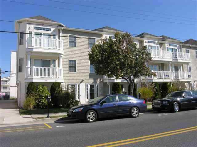 319 EAST WILDWOOD AVENUE UNIT B - WILDWOOD SUMMER VACATION RENTAL - 3 bedroom, 2 full bath condominium located on the beach block of Wildwood Avenue, closer to the pier with the Ferris wheel! Unit amenities include central air conditioning, private washer/dryer, dishwasher, "Digital Preferred" cable service with TVs in the living room and master bedroom, wireless internet access, deck with furniture, storage, two car garage and more! This is a non-smoking unit, no pets are allowed. 2 Queens, 2 Twins, 1 Queen Sleep Sofa; Sleeps 8. Wildwood Rentals, North Wildwood Rentals, Wildwood Crest Rentals and Diamond Beach Rentals in all price ranges for weekly, monthly, seasonal and weekend vacation rentals plus Wildwood real estate sales of homes, condos, vacation and investment properties in and around Wildwood New Jersey. We offer over 400 properties plus exclusive vacation homes so you can book the shore rental of your choice online and guarantee your vacation at the Shore. Rent with confidence at Island Realty Group!