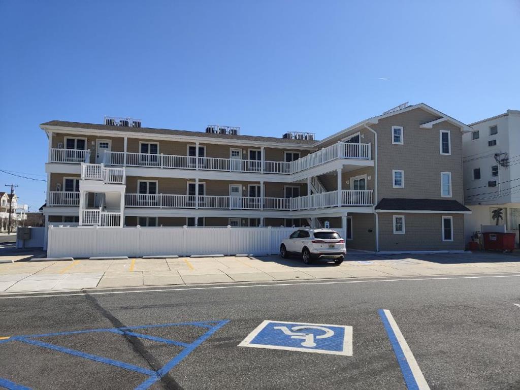 402 EAST 25TH AVENUE  OCEAN 7 SURF CONDOS #304 - NORTH WILDWOOD BEACHBLOCK SUMMER VACATION RENTALS with POOLS at WILDWOODRENTS.COM - Two bedroom/one bath condo located beach block in North Wildwood. Home has a full kitchen with range, fridge, dishwasher, disposal, microwave, Keurig, and blender. Sleeps 6; queen, 2 twin, and double sleep sofa. Amenities include central a/c, wifi, pool, outside shower, one car off street parking. North Wildwood Rentals, Wildwood Rentals, Wildwood Crest Rentals and Diamond Beach Rentals in all price ranges for weekly, monthly, seasonal and weekend vacation rentals plus Wildwood real estate sales of homes, condos, vacation and investment properties in and around Wildwood New Jersey. We offer over 400 properties plus exclusive vacation homes so you can book the shore rental of your choice online and guarantee your vacation at the Shore. Rent with confidence at Island Realty Group! Visit www.wildwoodrents.com to book online or call our office at 609.522.4999. Our office at 1701 New Jersey Avenue in North Wildwood is open 7 days a week!