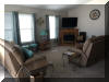 404 EAST 5TH AVENUE  CARIBBEAN CONDOS UNIT C - NORTH WILDWOOD SUMMER VACATION RENTALS at WILDWOODRENTS.COM managed by ISLAND REALTY GROUP, NORTH WILDWOOD REALTORS AND VACATION RENTAL MANAGEMENT -Welcome to your dream vacation rental in North Wildwood Beach Side! This stunning property is perfect for a group of up to 7 guests, offering 3 bedrooms and 2 full bathrooms for your comfort and convenience. As you step inside, you'll find a spacious and beautifully furnished living space with all the amenities you need for a relaxing stay. The kitchen is fully equipped with a dishwasher, microwave, disposal, coffee maker, toaster, blender, and more. Central AC and ceiling fans throughout the property ensure a comfortable temperature at all times. The sleeping arrangements include a luxurious king bed, a cozy queen bed, and a full/twin bunk, providing plenty of options for a good night's sleep. The property also features a washer, dryer, iron, ironing board, and vacuum cleaner for your convenience. Outside, you can enjoy the fresh air on the deck with deck furniture and an electric BBQ for outdoor cooking. The property also includes a 2-car garage for your vehicles. Additional amenities include 3 TVs with Firesticks, smart TV, high-speed internet, a lobster pot, food processor. Utilities are included, and cleaning is taken care of in the rate. This property is smoke-free and does not allow pets. Don't miss out on this fantastic vacation rental in North Wildwood! Book now and enjoy a memorable stay with your loved ones.  North Wildwood Rentals, Wildwood Rentals, Wildwood Crest Rentals and Diamond Beach Rentals in all price ranges for weekly, monthly, seasonal and weekend vacation rentals plus Wildwood real estate sales of homes, condos, vacation and investment properties in and around Wildwood New Jersey. We offer over 400 properties plus exclusive vacation homes so you can book the shore rental of your choice online and guarantee your vacation at the Shore. Rent with confidence at Island Realty Group! Visit www.wildwoodrents.com to book online or call our office at 609.522.4999. Our office at 1701 New Jersey Avenue in North Wildwood is open 7 days a week