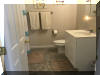 404 EAST 5TH AVENUE  CARIBBEAN CONDOS UNIT C - NORTH WILDWOOD SUMMER VACATION RENTALS at WILDWOODRENTS.COM managed by ISLAND REALTY GROUP, NORTH WILDWOOD REALTORS AND VACATION RENTAL MANAGEMENT -Welcome to your dream vacation rental in North Wildwood Beach Side! This stunning property is perfect for a group of up to 7 guests, offering 3 bedrooms and 2 full bathrooms for your comfort and convenience. As you step inside, you'll find a spacious and beautifully furnished living space with all the amenities you need for a relaxing stay. The kitchen is fully equipped with a dishwasher, microwave, disposal, coffee maker, toaster, blender, and more. Central AC and ceiling fans throughout the property ensure a comfortable temperature at all times. The sleeping arrangements include a luxurious king bed, a cozy queen bed, and a full/twin bunk, providing plenty of options for a good night's sleep. The property also features a washer, dryer, iron, ironing board, and vacuum cleaner for your convenience. Outside, you can enjoy the fresh air on the deck with deck furniture and an electric BBQ for outdoor cooking. The property also includes a 2-car garage for your vehicles. Additional amenities include 3 TVs with Firesticks, smart TV, high-speed internet, a lobster pot, food processor. Utilities are included, and cleaning is taken care of in the rate. This property is smoke-free and does not allow pets. Don't miss out on this fantastic vacation rental in North Wildwood! Book now and enjoy a memorable stay with your loved ones.  North Wildwood Rentals, Wildwood Rentals, Wildwood Crest Rentals and Diamond Beach Rentals in all price ranges for weekly, monthly, seasonal and weekend vacation rentals plus Wildwood real estate sales of homes, condos, vacation and investment properties in and around Wildwood New Jersey. We offer over 400 properties plus exclusive vacation homes so you can book the shore rental of your choice online and guarantee your vacation at the Shore. Rent with confidence at Island Realty Group! Visit www.wildwoodrents.com to book online or call our office at 609.522.4999. Our office at 1701 New Jersey Avenue in North Wildwood is open 7 days a week