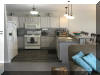 404 EAST 5TH AVENUE  CARIBBEAN CONDOS UNIT C - NORTH WILDWOOD SUMMER VACATION RENTALS at WILDWOODRENTS.COM managed by ISLAND REALTY GROUP, NORTH WILDWOOD REALTORS AND VACATION RENTAL MANAGEMENT -Welcome to your dream vacation rental in North Wildwood Beach Side! This stunning property is perfect for a group of up to 7 guests, offering 3 bedrooms and 2 full bathrooms for your comfort and convenience. As you step inside, you'll find a spacious and beautifully furnished living space with all the amenities you need for a relaxing stay. The kitchen is fully equipped with a dishwasher, microwave, disposal, coffee maker, toaster, blender, and more. Central AC and ceiling fans throughout the property ensure a comfortable temperature at all times. The sleeping arrangements include a luxurious king bed, a cozy queen bed, and a full/twin bunk, providing plenty of options for a good night's sleep. The property also features a washer, dryer, iron, ironing board, and vacuum cleaner for your convenience. Outside, you can enjoy the fresh air on the deck with deck furniture and an electric BBQ for outdoor cooking. The property also includes a 2-car garage for your vehicles. Additional amenities include 3 TVs with Firesticks, smart TV, high-speed internet, a lobster pot, food processor. Utilities are included, and cleaning is taken care of in the rate. This property is smoke-free and does not allow pets. Don't miss out on this fantastic vacation rental in North Wildwood! Book now and enjoy a memorable stay with your loved ones.  North Wildwood Rentals, Wildwood Rentals, Wildwood Crest Rentals and Diamond Beach Rentals in all price ranges for weekly, monthly, seasonal and weekend vacation rentals plus Wildwood real estate sales of homes, condos, vacation and investment properties in and around Wildwood New Jersey. We offer over 400 properties plus exclusive vacation homes so you can book the shore rental of your choice online and guarantee your vacation at the Shore. Rent with confidence at Island Realty Group! Visit www.wildwoodrents.com to book online or call our office at 609.522.4999. Our office at 1701 New Jersey Avenue in North Wildwood is open 7 days a week