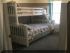 404 EAST 5TH AVENUE  CARIBBEAN CONDOS UNIT C - NORTH WILDWOOD SUMMER VACATION RENTALS at WILDWOODRENTS.COM managed by ISLAND REALTY GROUP, NORTH WILDWOOD REALTORS AND VACATION RENTAL MANAGEMENT -Welcome to your dream vacation rental in North Wildwood Beach Side! This stunning property is perfect for a group of up to 7 guests, offering 3 bedrooms and 2 full bathrooms for your comfort and convenience. As you step inside, you'll find a spacious and beautifully furnished living space with all the amenities you need for a relaxing stay. The kitchen is fully equipped with a dishwasher, microwave, disposal, coffee maker, toaster, blender, and more. Central AC and ceiling fans throughout the property ensure a comfortable temperature at all times. The sleeping arrangements include a luxurious king bed, a cozy queen bed, and a full/twin bunk, providing plenty of options for a good night's sleep. The property also features a washer, dryer, iron, ironing board, and vacuum cleaner for your convenience. Outside, you can enjoy the fresh air on the deck with deck furniture and an electric BBQ for outdoor cooking. The property also includes a 2-car garage for your vehicles. Additional amenities include 3 TVs with Firesticks, smart TV, high-speed internet, a lobster pot, food processor. Utilities are included, and cleaning is taken care of in the rate. This property is smoke-free and does not allow pets. Don't miss out on this fantastic vacation rental in North Wildwood! Book now and enjoy a memorable stay with your loved ones.  North Wildwood Rentals, Wildwood Rentals, Wildwood Crest Rentals and Diamond Beach Rentals in all price ranges for weekly, monthly, seasonal and weekend vacation rentals plus Wildwood real estate sales of homes, condos, vacation and investment properties in and around Wildwood New Jersey. We offer over 400 properties plus exclusive vacation homes so you can book the shore rental of your choice online and guarantee your vacation at the Shore. Rent with confidence at Island Realty Group! Visit www.wildwoodrents.com to book online or call our office at 609.522.4999. Our office at 1701 New Jersey Avenue in North Wildwood is open 7 days a week