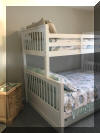 404 EAST 5TH AVENUE  CARIBBEAN CONDOS UNIT C - NORTH WILDWOOD SUMMER VACATION RENTALS at WILDWOODRENTS.COM managed by ISLAND REALTY GROUP, NORTH WILDWOOD REALTORS AND VACATION RENTAL MANAGEMENT -Welcome to your dream vacation rental in North Wildwood Beach Side! This stunning property is perfect for a group of up to 7 guests, offering 3 bedrooms and 2 full bathrooms for your comfort and convenience. As you step inside, you'll find a spacious and beautifully furnished living space with all the amenities you need for a relaxing stay. The kitchen is fully equipped with a dishwasher, microwave, disposal, coffee maker, toaster, blender, and more. Central AC and ceiling fans throughout the property ensure a comfortable temperature at all times. The sleeping arrangements include a luxurious king bed, a cozy queen bed, and a full/twin bunk, providing plenty of options for a good night's sleep. The property also features a washer, dryer, iron, ironing board, and vacuum cleaner for your convenience. Outside, you can enjoy the fresh air on the deck with deck furniture and an electric BBQ for outdoor cooking. The property also includes a 2-car garage for your vehicles. Additional amenities include 3 TVs with Firesticks, smart TV, high-speed internet, a lobster pot, food processor. Utilities are included, and cleaning is taken care of in the rate. This property is smoke-free and does not allow pets. Don't miss out on this fantastic vacation rental in North Wildwood! Book now and enjoy a memorable stay with your loved ones.  North Wildwood Rentals, Wildwood Rentals, Wildwood Crest Rentals and Diamond Beach Rentals in all price ranges for weekly, monthly, seasonal and weekend vacation rentals plus Wildwood real estate sales of homes, condos, vacation and investment properties in and around Wildwood New Jersey. We offer over 400 properties plus exclusive vacation homes so you can book the shore rental of your choice online and guarantee your vacation at the Shore. Rent with confidence at Island Realty Group! Visit www.wildwoodrents.com to book online or call our office at 609.522.4999. Our office at 1701 New Jersey Avenue in North Wildwood is open 7 days a week
