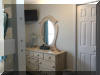 404 EAST 5TH AVENUE  CARIBBEAN CONDOS UNIT C - NORTH WILDWOOD SUMMER VACATION RENTALS at WILDWOODRENTS.COM managed by ISLAND REALTY GROUP, NORTH WILDWOOD REALTORS AND VACATION RENTAL MANAGEMENT -Welcome to your dream vacation rental in North Wildwood Beach Side! This stunning property is perfect for a group of up to 7 guests, offering 3 bedrooms and 2 full bathrooms for your comfort and convenience. As you step inside, you'll find a spacious and beautifully furnished living space with all the amenities you need for a relaxing stay. The kitchen is fully equipped with a dishwasher, microwave, disposal, coffee maker, toaster, blender, and more. Central AC and ceiling fans throughout the property ensure a comfortable temperature at all times. The sleeping arrangements include a luxurious king bed, a cozy queen bed, and a full/twin bunk, providing plenty of options for a good night's sleep. The property also features a washer, dryer, iron, ironing board, and vacuum cleaner for your convenience. Outside, you can enjoy the fresh air on the deck with deck furniture and an electric BBQ for outdoor cooking. The property also includes a 2-car garage for your vehicles. Additional amenities include 3 TVs with Firesticks, smart TV, high-speed internet, a lobster pot, food processor. Utilities are included, and cleaning is taken care of in the rate. This property is smoke-free and does not allow pets. Don't miss out on this fantastic vacation rental in North Wildwood! Book now and enjoy a memorable stay with your loved ones.  North Wildwood Rentals, Wildwood Rentals, Wildwood Crest Rentals and Diamond Beach Rentals in all price ranges for weekly, monthly, seasonal and weekend vacation rentals plus Wildwood real estate sales of homes, condos, vacation and investment properties in and around Wildwood New Jersey. We offer over 400 properties plus exclusive vacation homes so you can book the shore rental of your choice online and guarantee your vacation at the Shore. Rent with confidence at Island Realty Group! Visit www.wildwoodrents.com to book online or call our office at 609.522.4999. Our office at 1701 New Jersey Avenue in North Wildwood is open 7 days a week