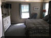 404 EAST 5TH AVENUE  CARIBBEAN CONDOS UNIT C - NORTH WILDWOOD SUMMER VACATION RENTALS at WILDWOODRENTS.COM managed by ISLAND REALTY GROUP, NORTH WILDWOOD REALTORS AND VACATION RENTAL MANAGEMENT -Welcome to your dream vacation rental in North Wildwood Beach Side! This stunning property is perfect for a group of up to 7 guests, offering 3 bedrooms and 2 full bathrooms for your comfort and convenience. As you step inside, you'll find a spacious and beautifully furnished living space with all the amenities you need for a relaxing stay. The kitchen is fully equipped with a dishwasher, microwave, disposal, coffee maker, toaster, blender, and more. Central AC and ceiling fans throughout the property ensure a comfortable temperature at all times. The sleeping arrangements include a luxurious king bed, a cozy queen bed, and a full/twin bunk, providing plenty of options for a good night's sleep. The property also features a washer, dryer, iron, ironing board, and vacuum cleaner for your convenience. Outside, you can enjoy the fresh air on the deck with deck furniture and an electric BBQ for outdoor cooking. The property also includes a 2-car garage for your vehicles. Additional amenities include 3 TVs with Firesticks, smart TV, high-speed internet, a lobster pot, food processor. Utilities are included, and cleaning is taken care of in the rate. This property is smoke-free and does not allow pets. Don't miss out on this fantastic vacation rental in North Wildwood! Book now and enjoy a memorable stay with your loved ones.  North Wildwood Rentals, Wildwood Rentals, Wildwood Crest Rentals and Diamond Beach Rentals in all price ranges for weekly, monthly, seasonal and weekend vacation rentals plus Wildwood real estate sales of homes, condos, vacation and investment properties in and around Wildwood New Jersey. We offer over 400 properties plus exclusive vacation homes so you can book the shore rental of your choice online and guarantee your vacation at the Shore. Rent with confidence at Island Realty Group! Visit www.wildwoodrents.com to book online or call our office at 609.522.4999. Our office at 1701 New Jersey Avenue in North Wildwood is open 7 days a week