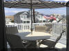 404 EAST 5TH AVENUE  CARIBBEAN CONDOS UNIT C - NORTH WILDWOOD SUMMER VACATION RENTALS at WILDWOODRENTS.COM managed by ISLAND REALTY GROUP, NORTH WILDWOOD REALTORS AND VACATION RENTAL MANAGEMENT -Welcome to your dream vacation rental in North Wildwood Beach Side! This stunning property is perfect for a group of up to 7 guests, offering 3 bedrooms and 2 full bathrooms for your comfort and convenience. As you step inside, you'll find a spacious and beautifully furnished living space with all the amenities you need for a relaxing stay. The kitchen is fully equipped with a dishwasher, microwave, disposal, coffee maker, toaster, blender, and more. Central AC and ceiling fans throughout the property ensure a comfortable temperature at all times. The sleeping arrangements include a luxurious king bed, a cozy queen bed, and a full/twin bunk, providing plenty of options for a good night's sleep. The property also features a washer, dryer, iron, ironing board, and vacuum cleaner for your convenience. Outside, you can enjoy the fresh air on the deck with deck furniture and an electric BBQ for outdoor cooking. The property also includes a 2-car garage for your vehicles. Additional amenities include 3 TVs with Firesticks, smart TV, high-speed internet, a lobster pot, food processor. Utilities are included, and cleaning is taken care of in the rate. This property is smoke-free and does not allow pets. Don't miss out on this fantastic vacation rental in North Wildwood! Book now and enjoy a memorable stay with your loved ones.  North Wildwood Rentals, Wildwood Rentals, Wildwood Crest Rentals and Diamond Beach Rentals in all price ranges for weekly, monthly, seasonal and weekend vacation rentals plus Wildwood real estate sales of homes, condos, vacation and investment properties in and around Wildwood New Jersey. We offer over 400 properties plus exclusive vacation homes so you can book the shore rental of your choice online and guarantee your vacation at the Shore. Rent with confidence at Island Realty Group! Visit www.wildwoodrents.com to book online or call our office at 609.522.4999. Our office at 1701 New Jersey Avenue in North Wildwood is open 7 days a week