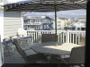 404 EAST 5TH AVENUE  CARIBBEAN CONDOS UNIT C - NORTH WILDWOOD SUMMER VACATION RENTALS at WILDWOODRENTS.COM managed by ISLAND REALTY GROUP, NORTH WILDWOOD REALTORS AND VACATION RENTAL MANAGEMENT -Welcome to your dream vacation rental in North Wildwood Beach Side! This stunning property is perfect for a group of up to 7 guests, offering 3 bedrooms and 2 full bathrooms for your comfort and convenience. As you step inside, you'll find a spacious and beautifully furnished living space with all the amenities you need for a relaxing stay. The kitchen is fully equipped with a dishwasher, microwave, disposal, coffee maker, toaster, blender, and more. Central AC and ceiling fans throughout the property ensure a comfortable temperature at all times. The sleeping arrangements include a luxurious king bed, a cozy queen bed, and a full/twin bunk, providing plenty of options for a good night's sleep. The property also features a washer, dryer, iron, ironing board, and vacuum cleaner for your convenience. Outside, you can enjoy the fresh air on the deck with deck furniture and an electric BBQ for outdoor cooking. The property also includes a 2-car garage for your vehicles. Additional amenities include 3 TVs with Firesticks, smart TV, high-speed internet, a lobster pot, food processor. Utilities are included, and cleaning is taken care of in the rate. This property is smoke-free and does not allow pets. Don't miss out on this fantastic vacation rental in North Wildwood! Book now and enjoy a memorable stay with your loved ones.  North Wildwood Rentals, Wildwood Rentals, Wildwood Crest Rentals and Diamond Beach Rentals in all price ranges for weekly, monthly, seasonal and weekend vacation rentals plus Wildwood real estate sales of homes, condos, vacation and investment properties in and around Wildwood New Jersey. We offer over 400 properties plus exclusive vacation homes so you can book the shore rental of your choice online and guarantee your vacation at the Shore. Rent with confidence at Island Realty Group! Visit www.wildwoodrents.com to book online or call our office at 609.522.4999. Our office at 1701 New Jersey Avenue in North Wildwood is open 7 days a week