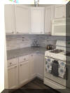 404 EAST 5TH AVENUE  CARIBBEAN CONDOS UNIT C - NORTH WILDWOOD SUMMER VACATION RENTALS at WILDWOODRENTS.COM managed by ISLAND REALTY GROUP, NORTH WILDWOOD REALTORS AND VACATION RENTAL MANAGEMENT -Welcome to your dream vacation rental in North Wildwood Beach Side! This stunning property is perfect for a group of up to 7 guests, offering 3 bedrooms and 2 full bathrooms for your comfort and convenience. As you step inside, you'll find a spacious and beautifully furnished living space with all the amenities you need for a relaxing stay. The kitchen is fully equipped with a dishwasher, microwave, disposal, coffee maker, toaster, blender, and more. Central AC and ceiling fans throughout the property ensure a comfortable temperature at all times. The sleeping arrangements include a luxurious king bed, a cozy queen bed, and a full/twin bunk, providing plenty of options for a good night's sleep. The property also features a washer, dryer, iron, ironing board, and vacuum cleaner for your convenience. Outside, you can enjoy the fresh air on the deck with deck furniture and an electric BBQ for outdoor cooking. The property also includes a 2-car garage for your vehicles. Additional amenities include 3 TVs with Firesticks, smart TV, high-speed internet, a lobster pot, food processor. Utilities are included, and cleaning is taken care of in the rate. This property is smoke-free and does not allow pets. Don't miss out on this fantastic vacation rental in North Wildwood! Book now and enjoy a memorable stay with your loved ones.  North Wildwood Rentals, Wildwood Rentals, Wildwood Crest Rentals and Diamond Beach Rentals in all price ranges for weekly, monthly, seasonal and weekend vacation rentals plus Wildwood real estate sales of homes, condos, vacation and investment properties in and around Wildwood New Jersey. We offer over 400 properties plus exclusive vacation homes so you can book the shore rental of your choice online and guarantee your vacation at the Shore. Rent with confidence at Island Realty Group! Visit www.wildwoodrents.com to book online or call our office at 609.522.4999. Our office at 1701 New Jersey Avenue in North Wildwood is open 7 days a week