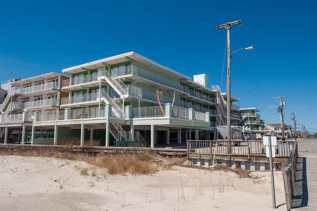 404 EAST DENVER AVENUE  FOUR WINDS #308 - WILDWOOD CREST BEACHFRONT SUMMER VACATION RENTALS with POOLS at WILDWOODRENTS.COM managed by ISLAND REALTY GROUP - Two bedroom, one bath condo located at the Four Winds Condominiums in Wildwood Crest. Unit has a kitchen with fridge, 2 burner stovetop, microwave, coffee maker. Amenities include 2 wall a/c units, coin op washer/dryer, 1 car off street parking, wifi, pool, elevator, outside shower, gas bbq (3), ocean view from balcony. Sleeps 6: queen, double, and queen sleep sofa. Wildwood Crest Rentals, North Wildwood Rentals, Wildwood Rentals and Diamond Beach Rentals in all price ranges for weekly, monthly, seasonal and weekend vacation rentals plus Wildwood real estate sales of homes, condos, vacation and investment properties in and around Wildwood New Jersey. We offer over 400 properties plus exclusive vacation homes so you can book the shore rental of your choice online and guarantee your vacation at the Shore. Rent with confidence at Island Realty Group! Visit www.wildwoodrents.com to book online or call our office at 609.522.4999. Our office at 1701 New Jersey Avenue in North Wildwood is open 7 days a week!